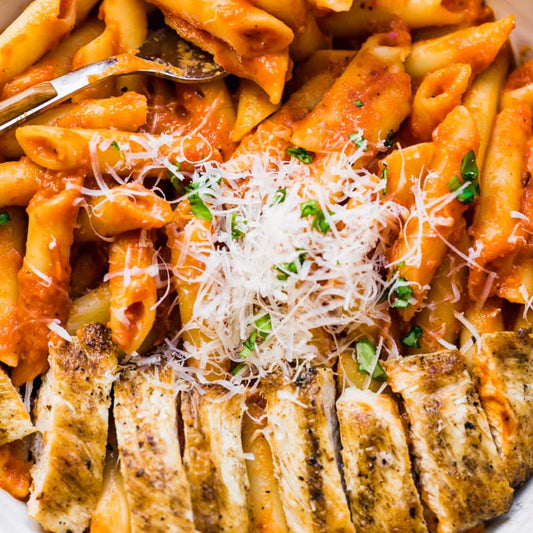 Sun-dried Tomato Pesto Penne with Rosemary Parmesan Chicken